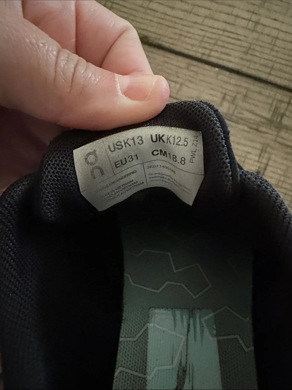 On Running Black and Teal Kids' Sneaker